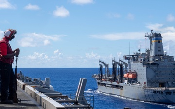 USS Ronald Reagan (CVN 76) conducts a fueling-at-sea and replenishment-at-sea with USNS Rappahannock (T-AO 204) and  USNS Charles Drew (T-AKE-10)