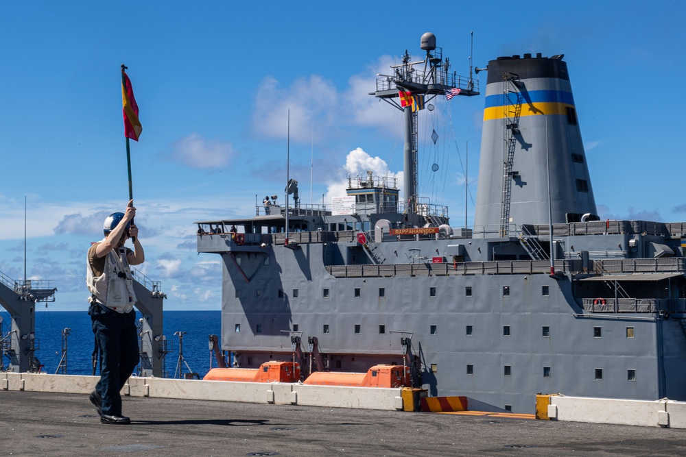 USS Ronald Reagan (CVN 76) conducts a fueling-at-sea and replenishment-at-sea with USNS Rappahannock (T-AO 204) and  USNS Charles Drew (T-AKE-10)