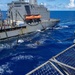 USS Ronald Reagan (CVN 76) conducts a fueling-at-sea and replenishment-at-sea with USNS Rappahannock (T-AO 204) and  USNS Charles Drew (T-AKE-10)