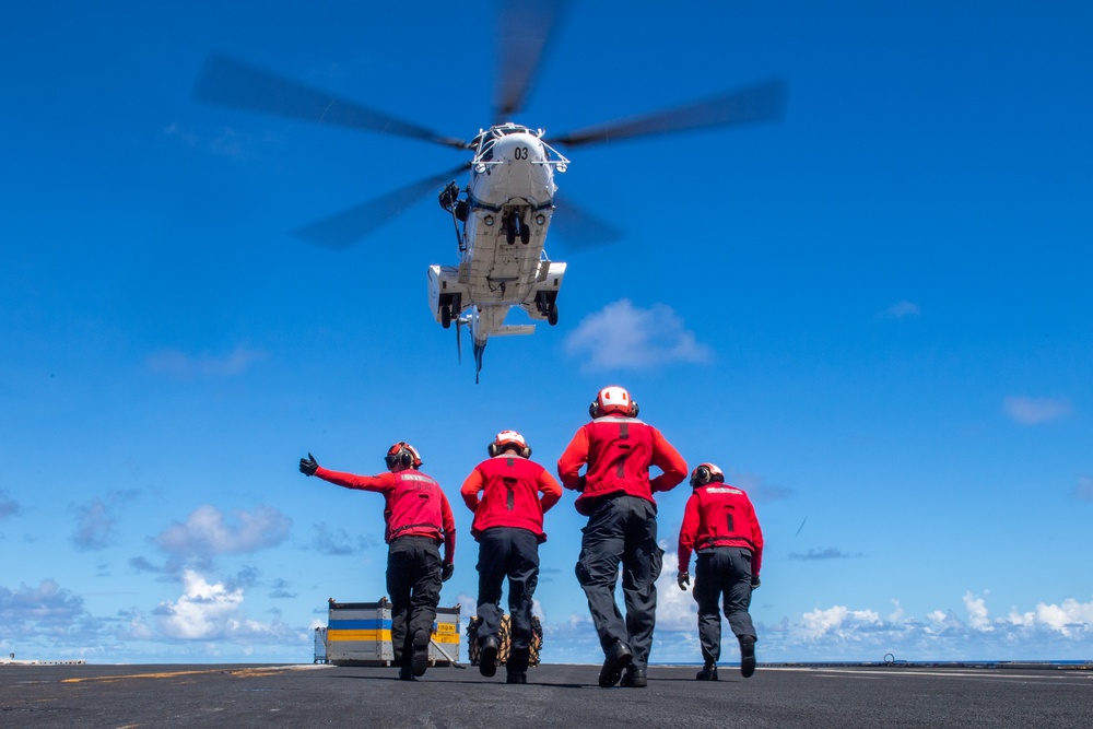 USS Ronald Reagan (CVN 76) conducts a fueling-at-sea and replenishment-at-sea with USNS Rappahannock (T-AO 204) and  USNS Charles Drew (T-AKE-10)