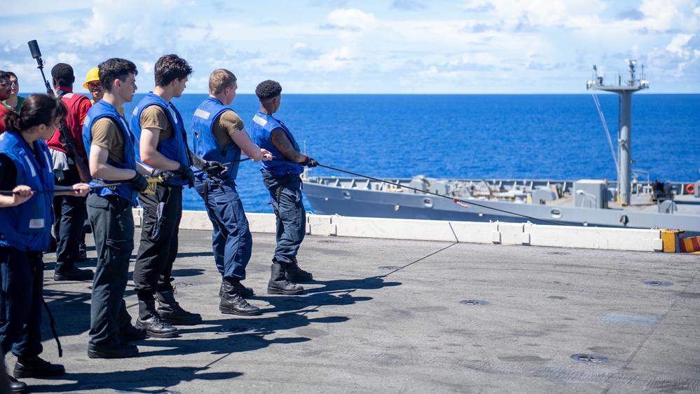 USS Ronald Reagan (CVN 76) conducts a fueling-at-sea and replenishment-at-sea with USNS Rappahannock (T-AO 204) and  USNS Charles Drew (T-AKE-10)