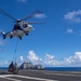 USS Ronald Reagan (CVN 76) conducts a fueling-at-sea and replenishment-at-sea with USNS Rappahannock (T-AO 204) and  USNS Charles Drew (T-AKE-10)