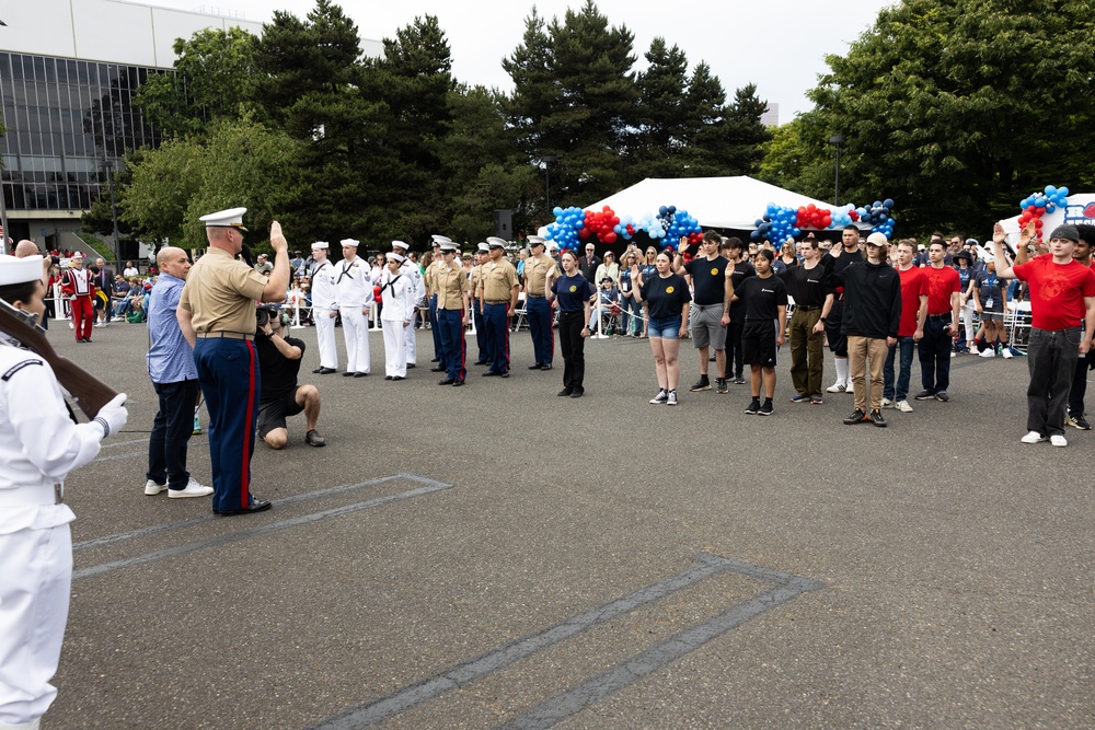 Marine Corps Poolees take Oath of Enlistment at Grand Floral Parade