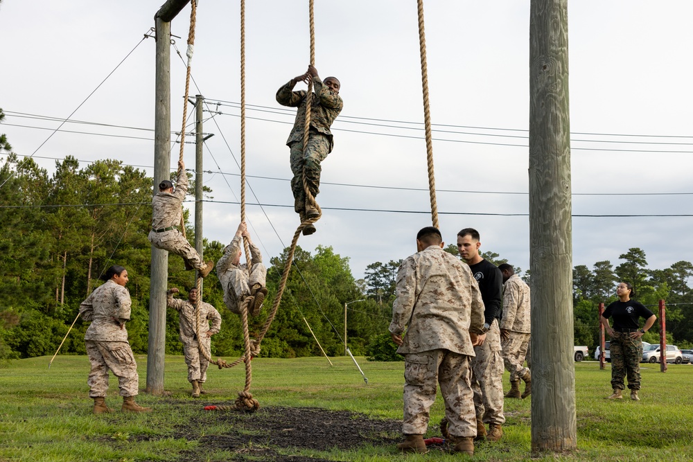 Personnel Administration School participate in an obstacle course