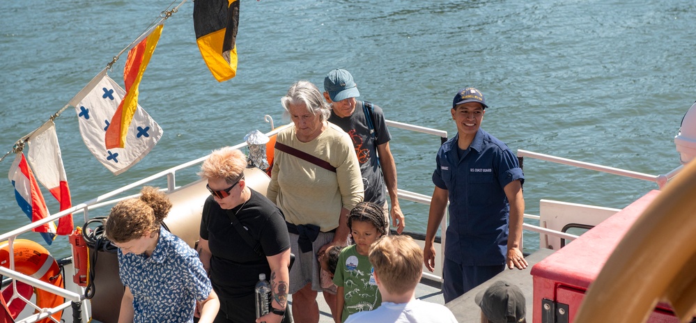 Crewmembers from Coast Guard Cutters give guided tours of their cutters on the Columbia River in Portland