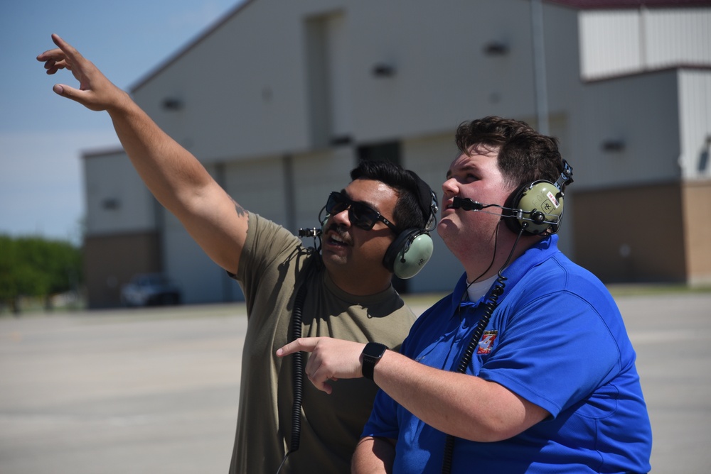 Jacob Howard watches KC-135 prepare for takeoff