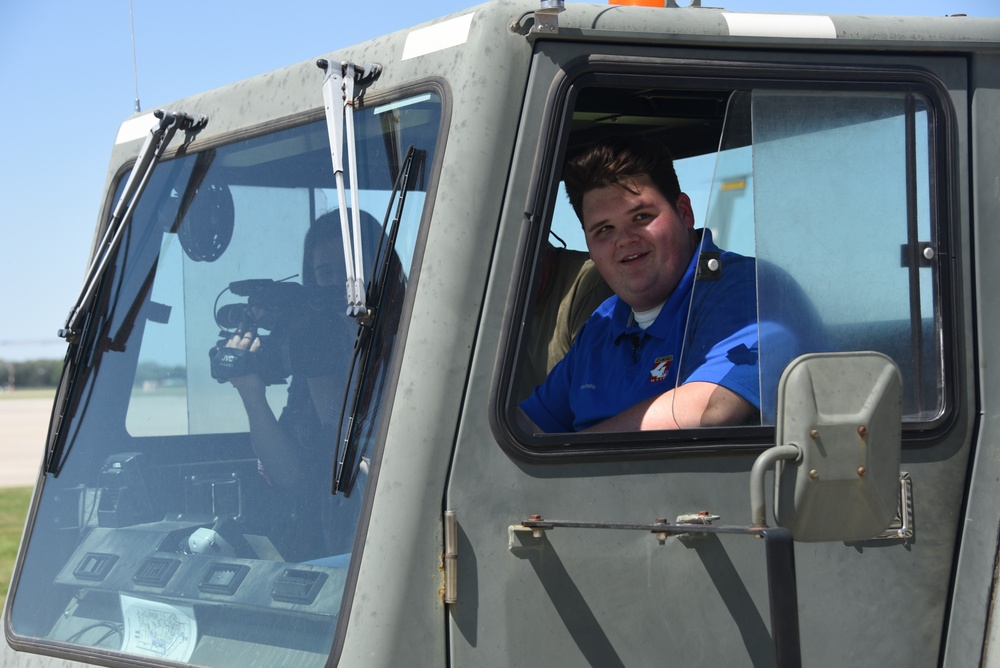 KTIV Morning Meteorologist Jacob Howard drives a tug