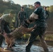 U.S. Marines with the Provost Marshall Office K-9 conduct water aggression training with military working dogs