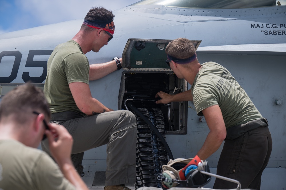 Marine All-Weather Fighter Attack Squadron (VMFA(AW)) 224 loads ordnance onto F/A-18 Hornet aircraft