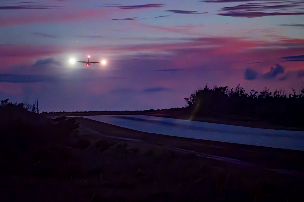 KC-130 practices approaches and touch-and-go maneuvers in support of VS24