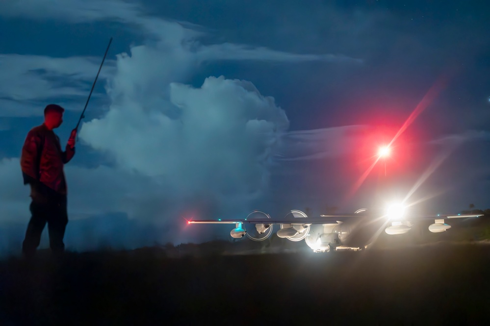 KC-130 practices approaches and touch-and-go maneuvers in support of VS24