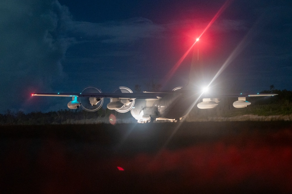 KC-130 practices approaches and touch-and-go maneuvers in support of VS24