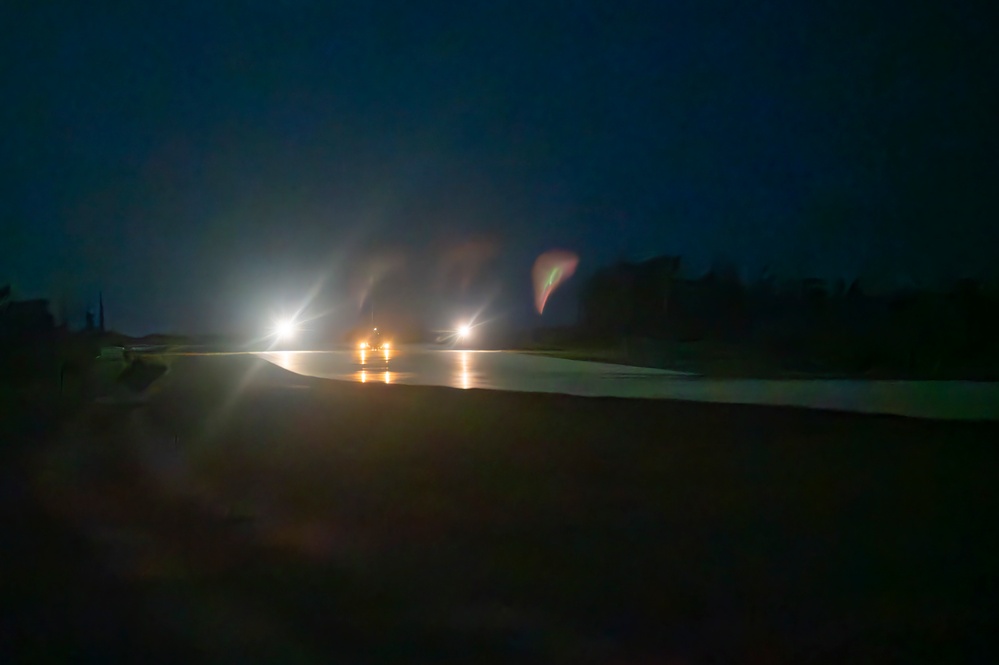 KC-130 practices approaches and touch-and-go maneuvers in support of VS24