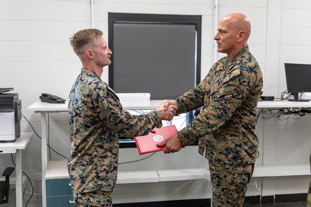 MRF-D 24.3: MARFORCYBER CG reenlists Staff Sgt. Noah Paul