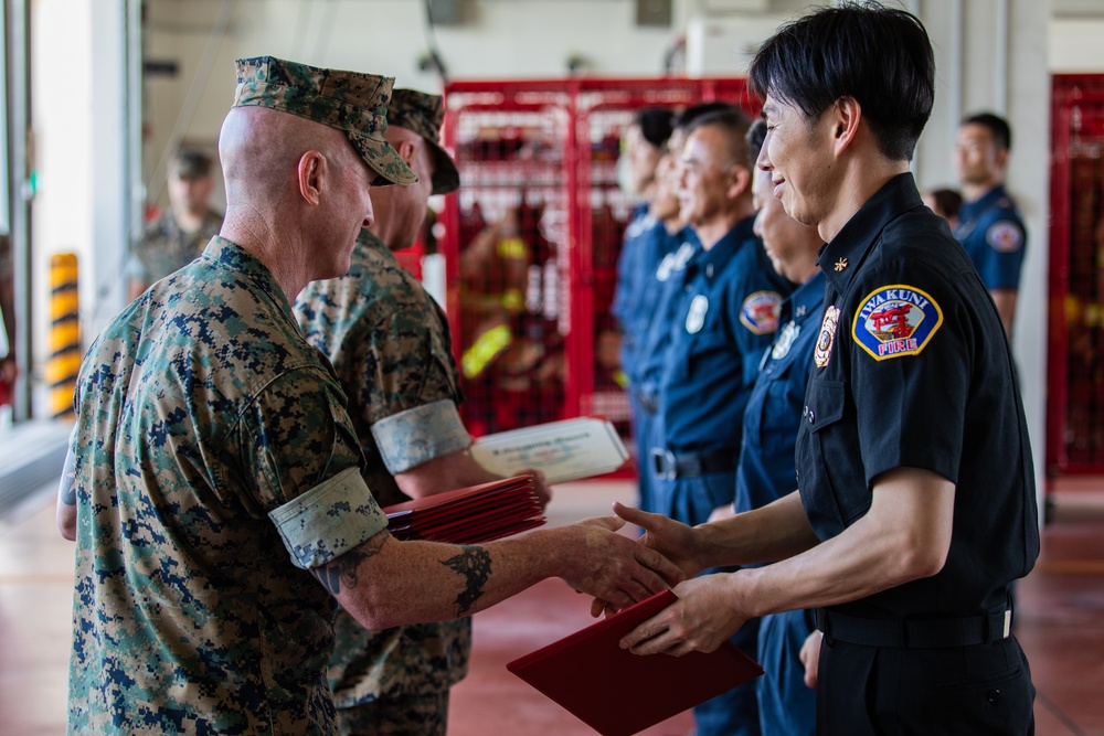 Marine Corps Installations Command Commanding General awards Master Labor Contract First Responders at Marine Corps Air Station Iwakuni