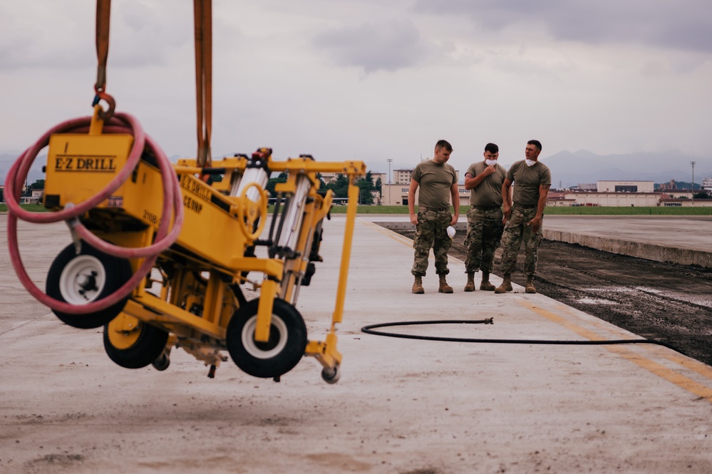 The 139th Civil Engineer Squadron starts digging for ramp extention