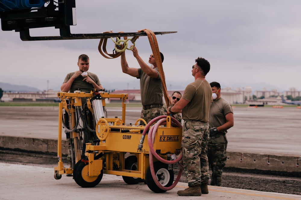 The 139th Civil Engineer Squadron starts digging for ramp extention