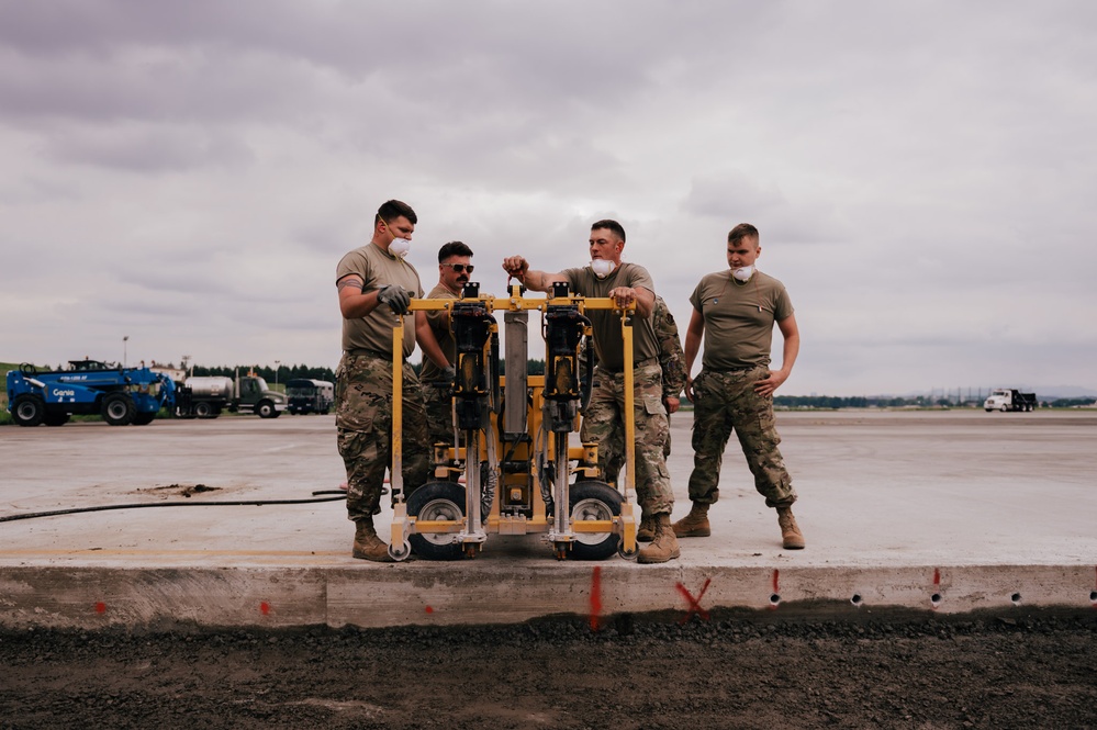 The 139th Civil Engineer Squadron starts digging for ramp extention