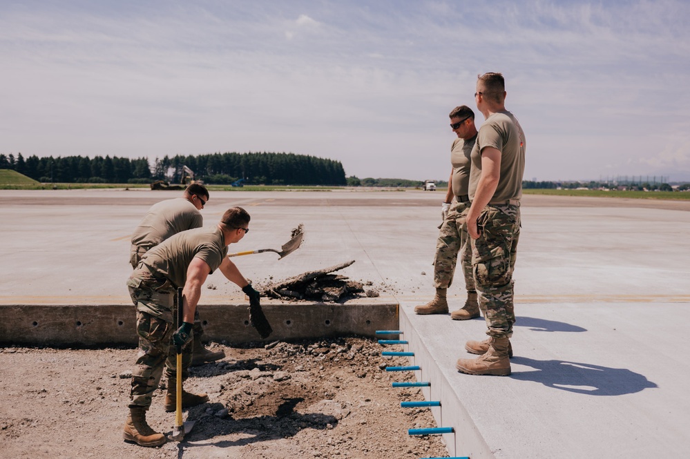 The 139th Civil Engineer Squadron starts digging for ramp extention