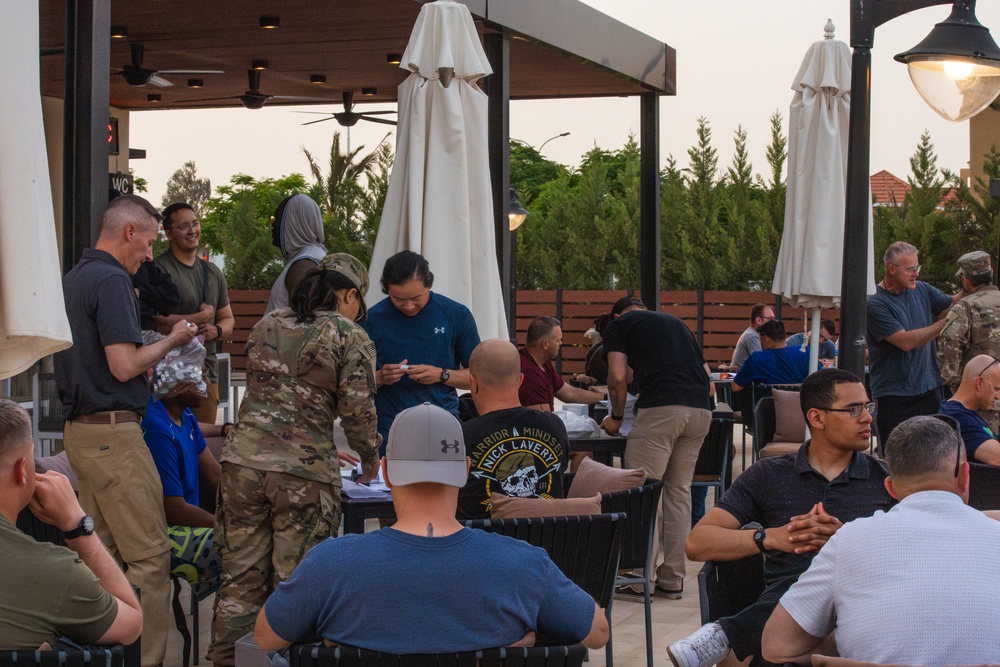Soldiers honor the fallen during a Memorial Day candlelight service