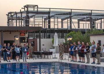 Soldiers honor the fallen during a Memorial Day candlelight service