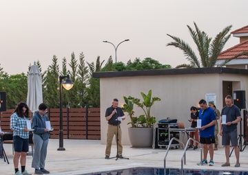 Soldiers honor the fallen during a Memorial Day candlelight service