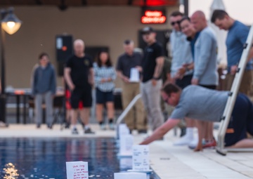 Soldiers honor the fallen during a Memorial Day candlelight service