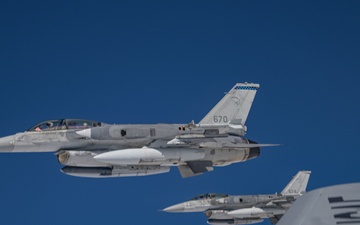 Fighter aircraft aerial refuel during RED FLAG-Alaska 24-2