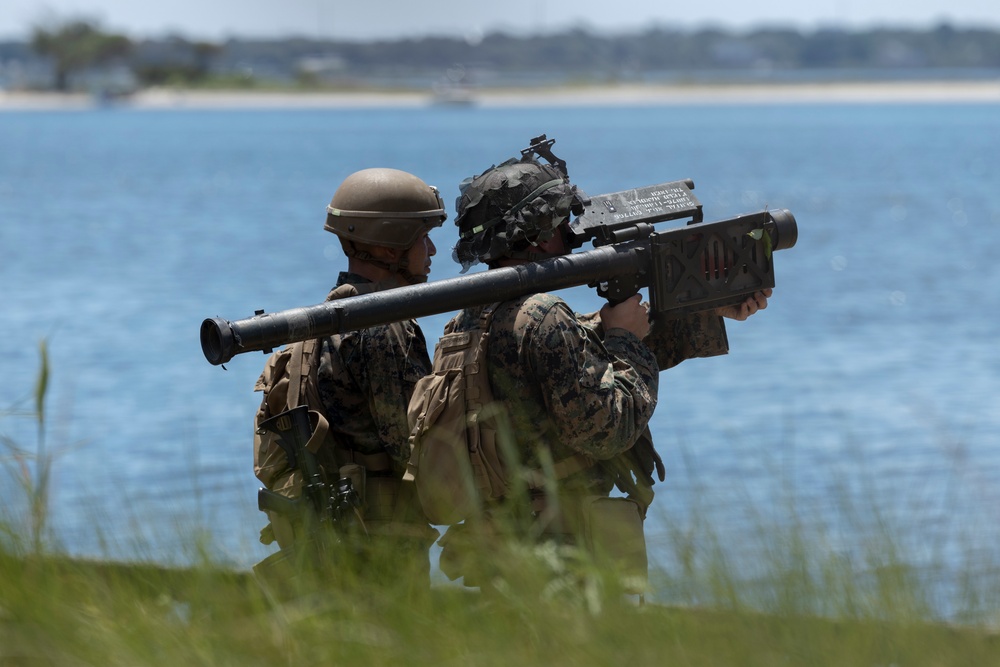 U.S. Marines with Marine Air Control Squadron 24 conduct base defense