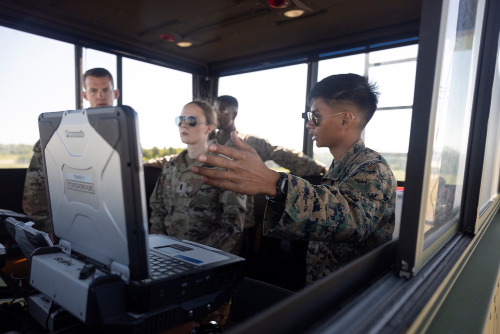 U.S. Marines with Marine Air Control Squadron 24 conduct base defense