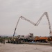 The 139th Civil Engineer Squadron lay concrete for ramp extention