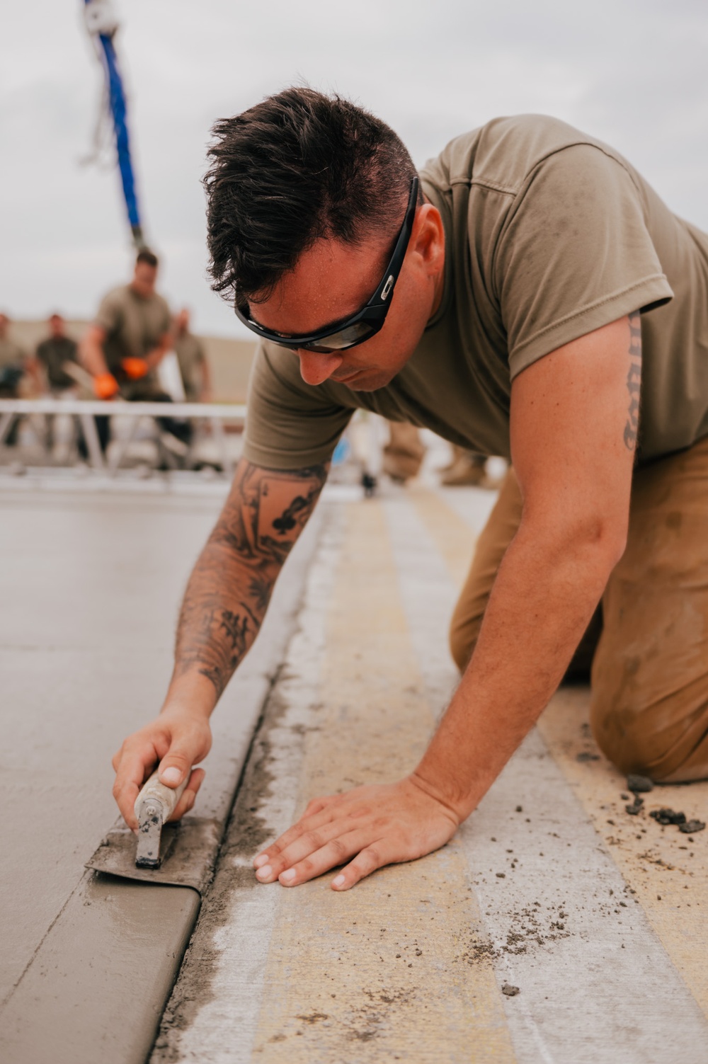 The 139th Civil Engineer Squadron lay concrete for ramp extention