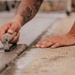 The 139th Civil Engineer Squadron lay concrete for ramp extention