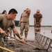 The 139th Civil Engineer Squadron lay concrete for ramp extention