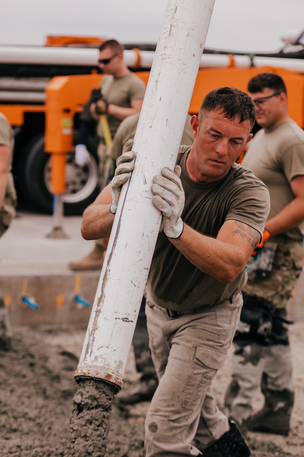 The 139th Civil Engineer Squadron lay concrete for ramp extention