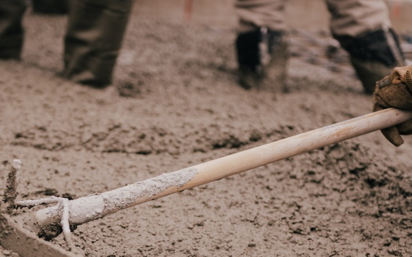 The 139th Civil Engineer Squadron lay concrete for ramp extention