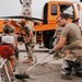 The 139th Civil Engineer Squadron lay concrete for ramp extention