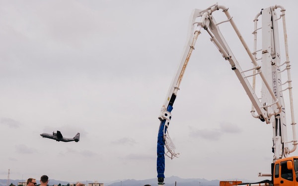 The 139th Civil Engineer Squadron lay concrete for ramp extention