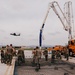 The 139th Civil Engineer Squadron lay concrete for ramp extention