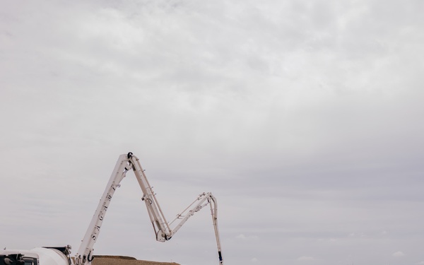 The 139th Civil Engineer Squadron lay concrete for ramp extention
