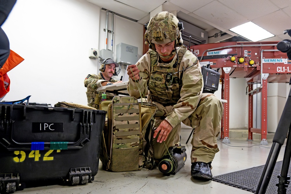 An Explosive Ordnance Technician Prepares to Respond to an Improvised Explosive Device (lED)