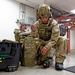 An Explosive Ordnance Technician Prepares to Respond to an Improvised Explosive Device (lED)