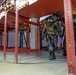 An EOD Response Team Approaches a Simulated Explosive Device in the Airport Baggage Handling Area