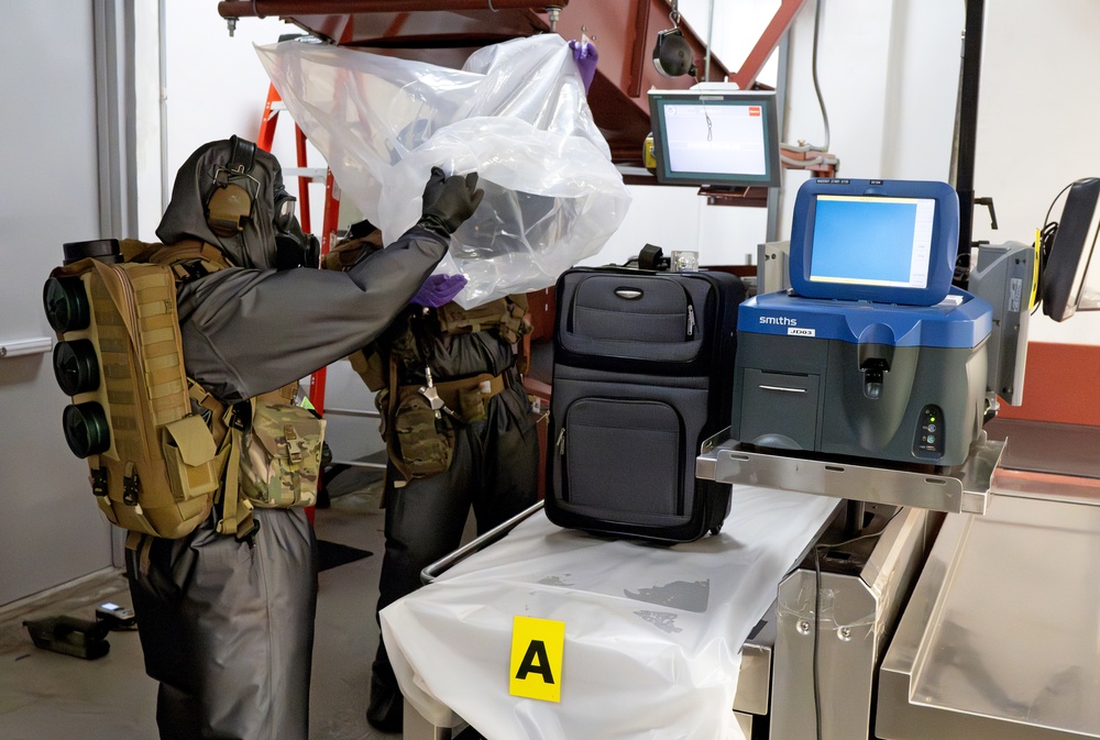 EOD Technicians Respond to an Improvised Explosive Device (lED) During a Drill at the Guam Airport