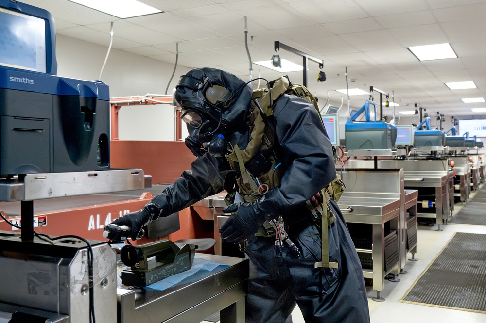 An EOD Technician Preps A Workspace While Responding to an Improvised Explosive Device Drill