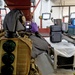 An EOD Technician Assesses an Improvised Explosive Device During a Drill at the Guam Airport