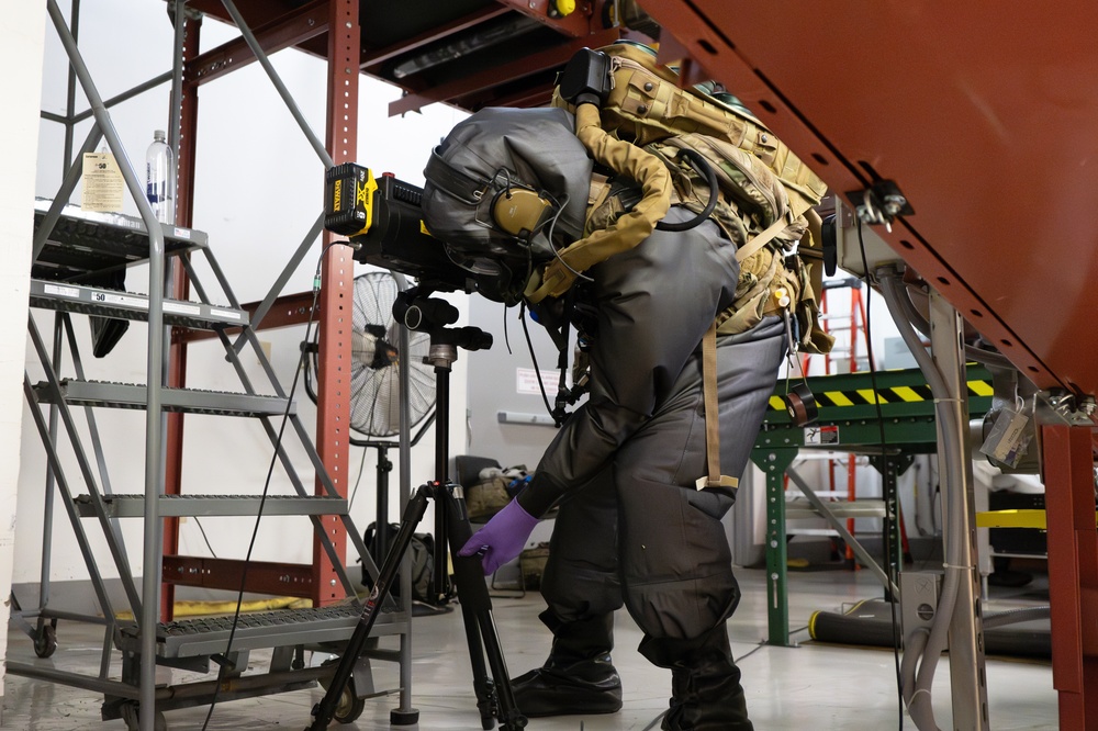 An EOD Technician Prepares to Neutralize an Improvised Explosive Device During a Drill at the Guam Airport