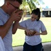 Airmen Crack Fresh Coconut - Saipan