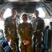 Pfc stands with command in C-17 cockpit