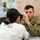 Soldier gives eye exam for IRT Mission Soldier gives eye exam for IRT Mission